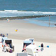 Blick auf den Strand von Wangerooge mit vielen Strandkörben.